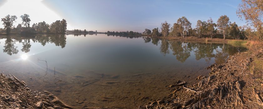 Beautiful view of a calm, tranquil lake in Alentejo, Portugal.