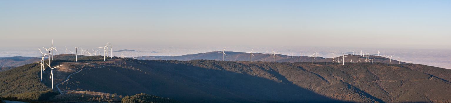 Eolic wind generators on top of hills in Portugal.