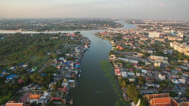 aerial view settlement of asian community along chaopraya river in bangkok thailand