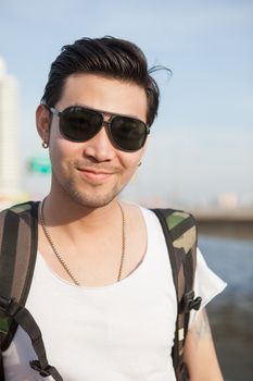 portrait head shot of asian man happy face