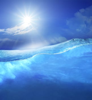 under clear sea blue water with sun shining on sky above use for ocean nature background 