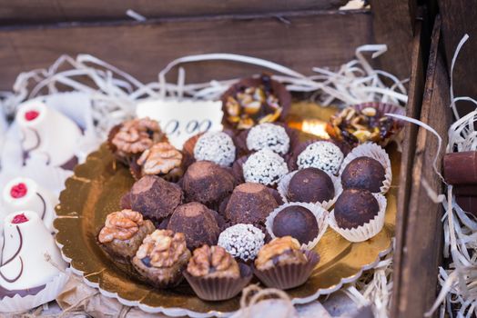 delicious mouthwatering chocolates on the counter outdoors