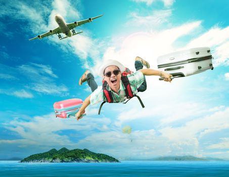 young man flying from passenger plane to natural destination island on blue ocean with happiness face emotion use for people traveling on vacation holiday in summer season 