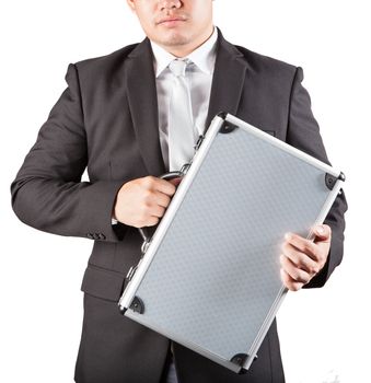 business man holding metal strong briefcase isolated white background