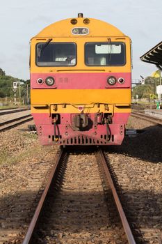 front view of trains on railways track parking in railroads platform station 