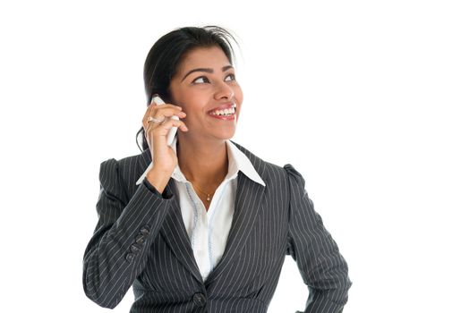 Black business woman talking on smartphone and smiling, isolated on white background.