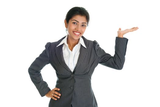 Black business woman in formalwear smiling and hand showing something, isolated on white background.