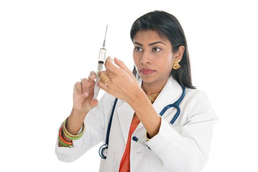 Indian female doctor with syringe, isolated on white background.