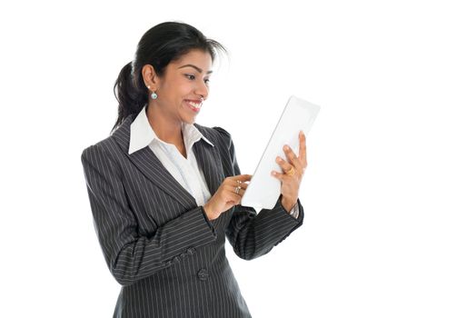 Black business woman using tablet pc and smiling, isolated on white background.