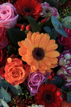 Bright colored weddiing arrangement: mixed flowers in various colors