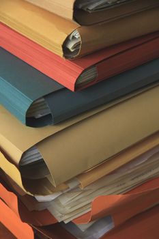 Stacked office files: pile of files in an office