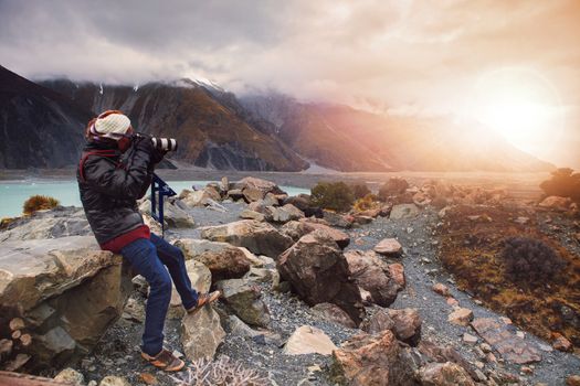 photographer at aoraki - mt.cook national park new zealand