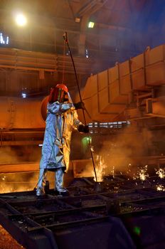 Steel worker inside of steel plant