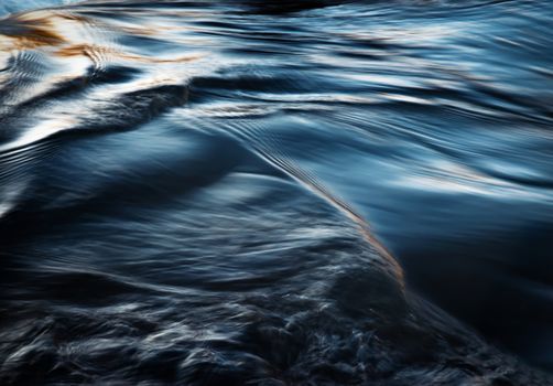 abstract background dark autumn water level with ripples