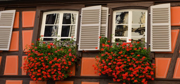 Colorful traditional french houses on the side of river Lauch in Petite Venise, Colmar, France