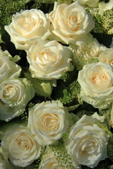 White roses in a bridal bouquet