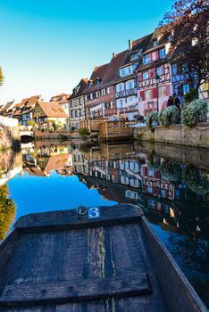 Colorful traditional french houses on the side of river Lauch in Petite Venise, Colmar, France