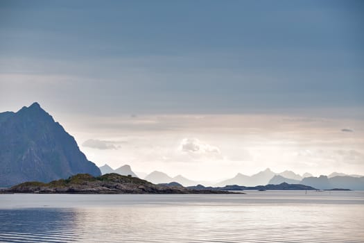 Norway fjord and lofoten islands. Cloudy Nordic day.