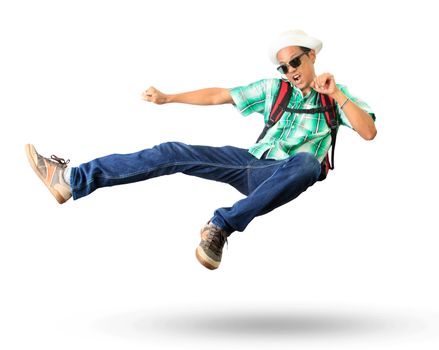 young man with back pack sky kick jumping action isolated white background