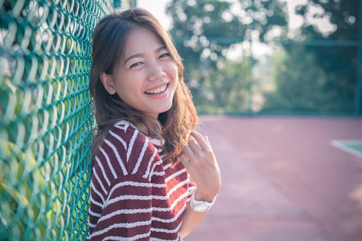 smiling face happiness emotion of asian younger woman with no make up face