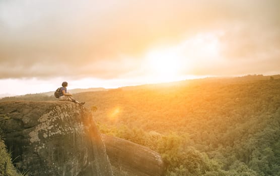 traveling woman relaxing trekking on rock cliff use for people leisure lifestyle