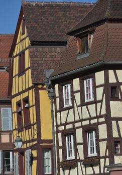 Colorful traditional french houses on the side of river Lauch in Petite Venise, Colmar, France