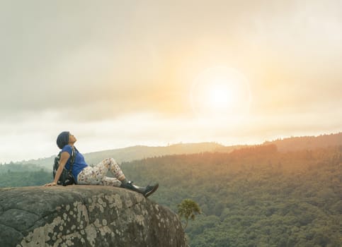 traveling woman relaxing trekking on rock cliff use for people leisure lifestyle