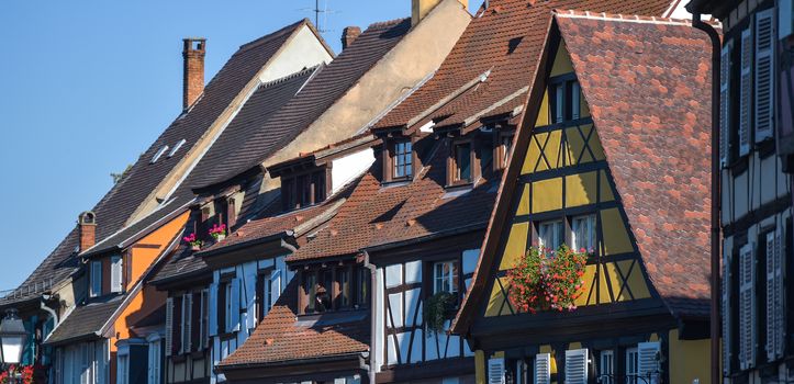 Colorful traditional french houses on the side of river Lauch in Petite Venise, Colmar, France