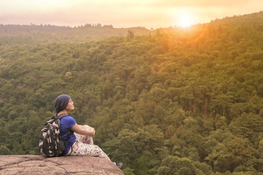 traveling woman relaxing trekking on rock cliff use for people leisure lifestyle