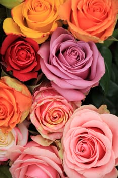 Multicolored roses in a colorful wedding arrangement