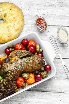 Meatloaf of veal stuffed with and assortment of sauces