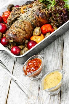 Meatloaf of veal stuffed with and assortment of sauces