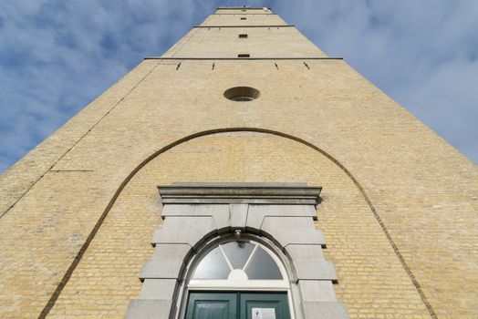 The famous historic lighthouse called the Brandaris in the place West-Terschelling on the North Sea Island of Terschelling in the Netherlands
