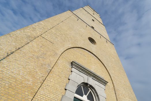 The famous historic lighthouse called the Brandaris in the place West-Terschelling on the North Sea Island of Terschelling in the Netherlands
