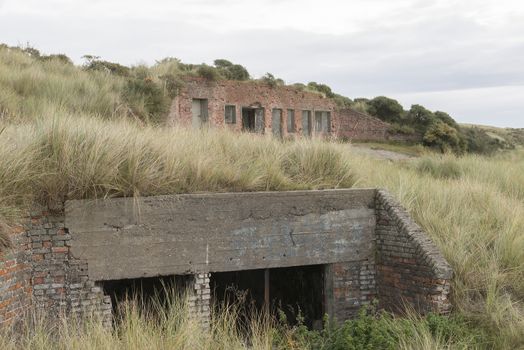 Old German bunker on the island of Terschelling in the Netherlands, part of the Atlantic Wall, a more than 5000 kilometres long line of defence, which nazi Germany during the second world war in the occupied territories has laid out to prevent an Allied invasion
