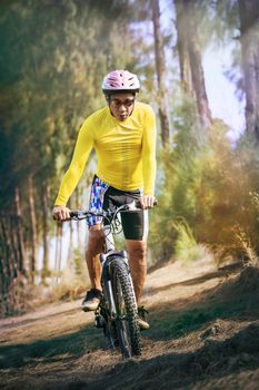 young man riding mountain bike mtb in jungle track use for sport healthy and holiday activities life style