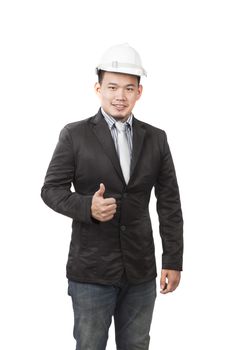 young asian engineering man standing by wearing western suit and white safety helmet over head sign good qaulity of working people isolated background