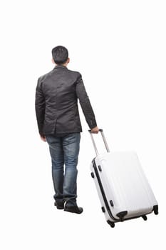 rear view of young man and pulling belonging luggage walking to forward isolated white background use for people traveling ,journey theme