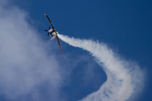 Acrobatic Aircraft flying away from camera