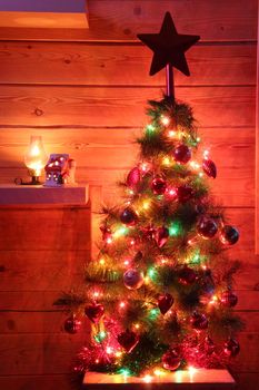 Christmas, New Year's fir tree decorated with toys and lights