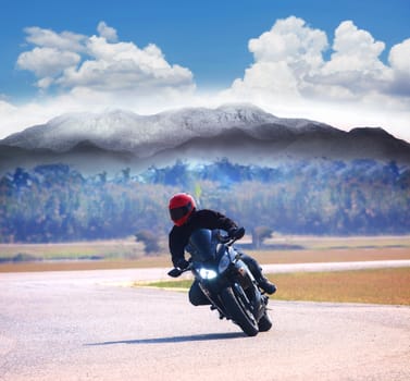 young man riding motorcycle on asphalt road against mountain highways background use for people activities on holiday vacation and motor sport hobby