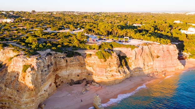 Aerial from famous beach Praia da Marinha in the Algarve Portugal at sunset