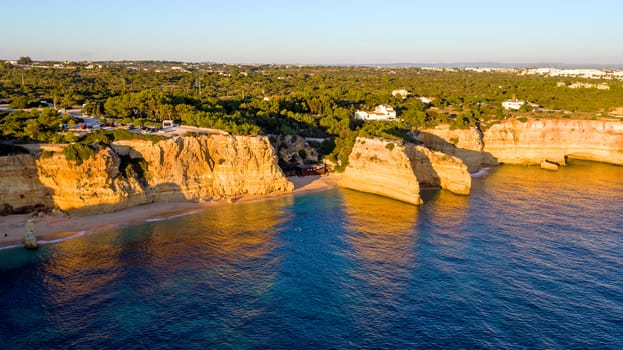 Aerial from famous beach Praia da Marinha in the Algarve Portugal at sunset