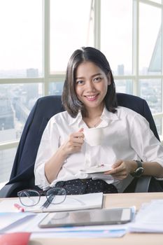 working woman and beverage cup in hand toothy smiling face with happiness emotion use for people and office life