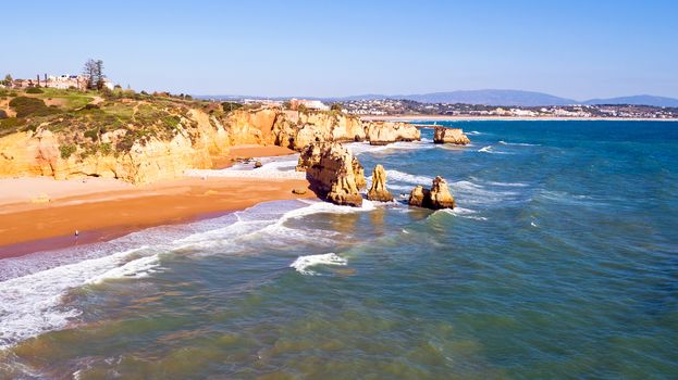 Aerial from rocks and ocean near Lagos in Portugal