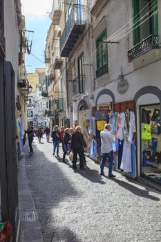 AMALFI TOWN SOUTH ITALY - NOVEMBER 5 : toursit walking in narrow street in amalfi town important traveling destination of mediterranean coast line on november 5, 2016 in amalfi town south italy