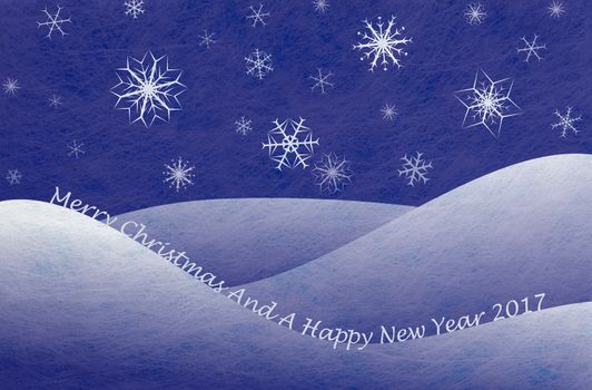 Winter scene with snowy mountains and snowflakes and the words Merry Christmas And A Happy New Year 2017, christmas card