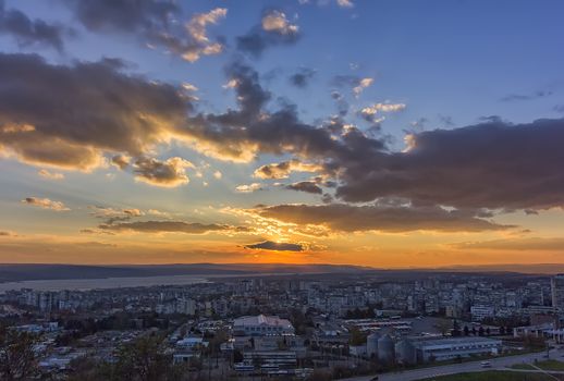 Beautiful sunset over the city . Varna, Bulgaria