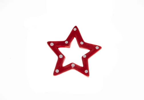 Beautiful red star a new year toy isolated on white