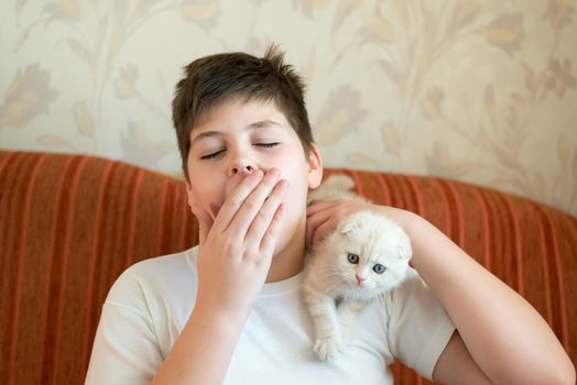 The boy is allergic to a cat